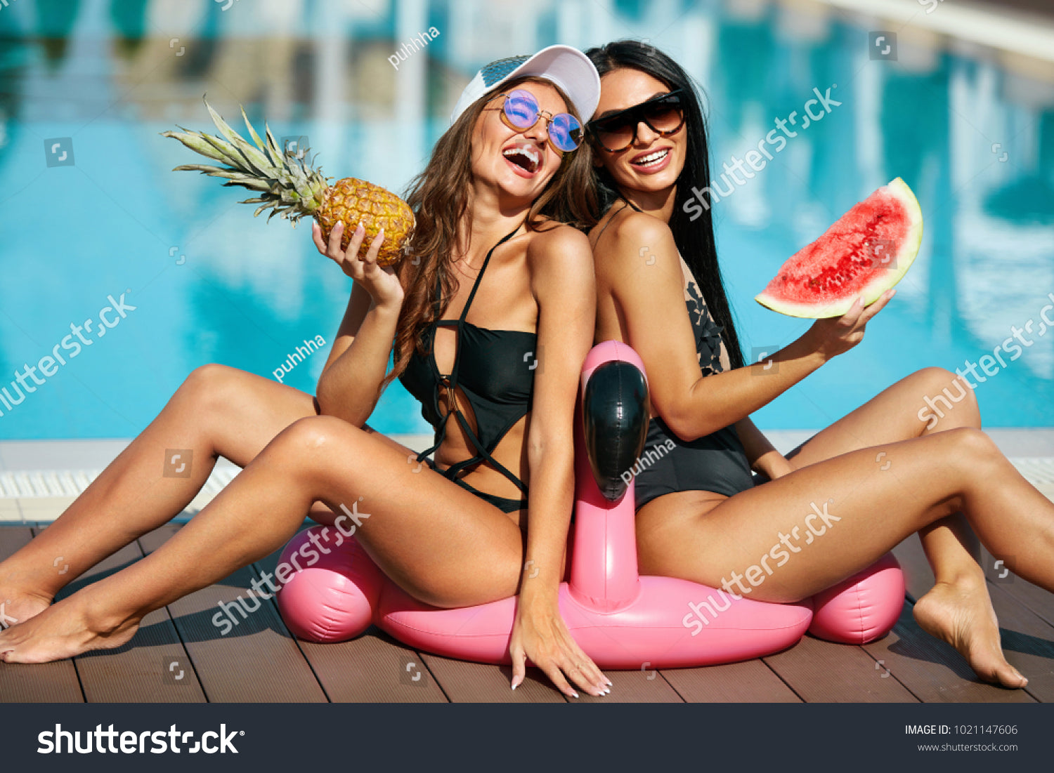Friends showing off their summer tans